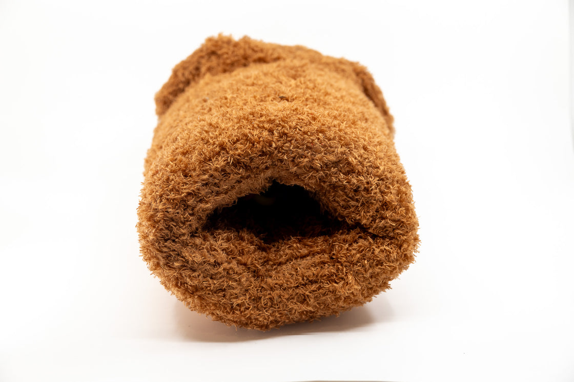 Rear opening of sensory dog toy showing plush interior